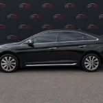 Hyundai Sonata 2017 чорний вид збоку для оренди